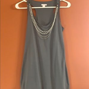 Tank top including necklaces